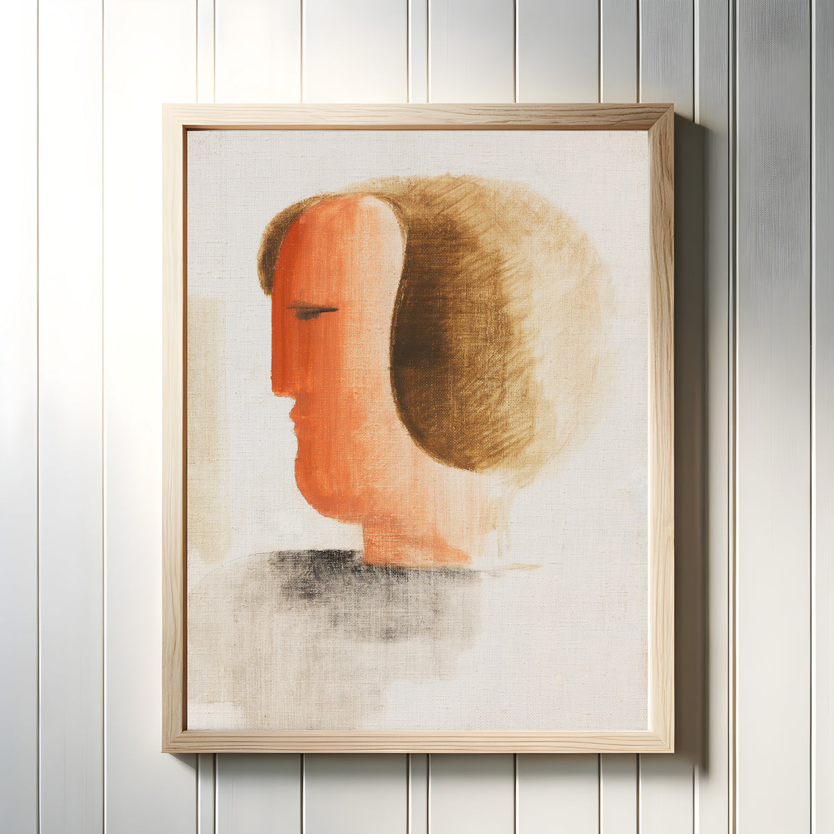 Framed art print of Kopf nach links by Oskar Schlemmer, in a light wood frame on a white panelled wall