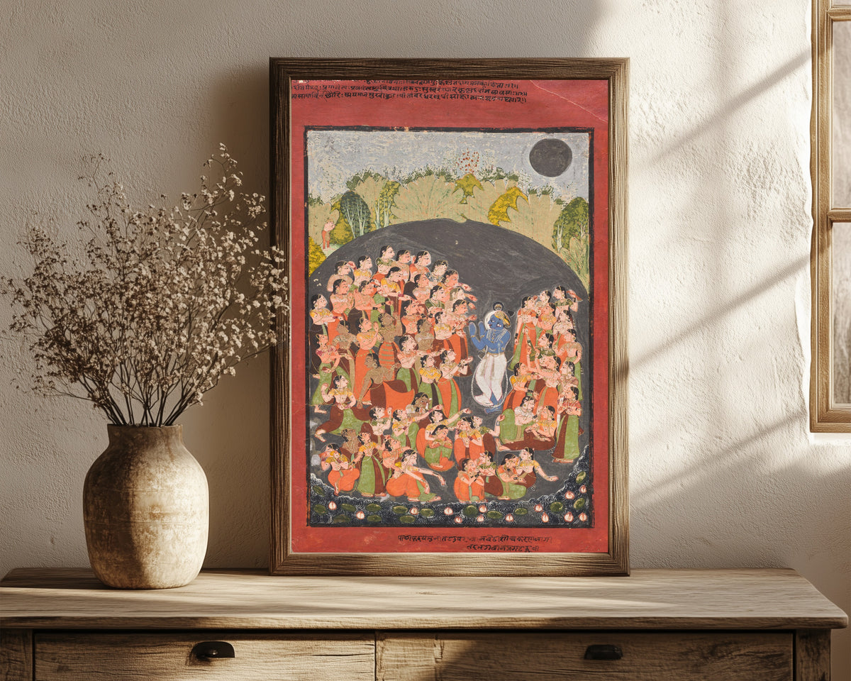 Framed art print of Krishna and the Gopis Gather for Rasamandala by Kota school, in a dark wood frame leaning on a rustic console beside dried flowers