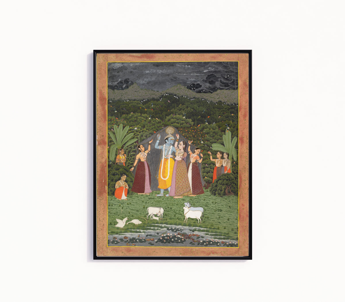 Framed art print of Krishna and the Gopis Take Shelter from the Rain by Jaipur school, in a slim black frame on a plain white wall