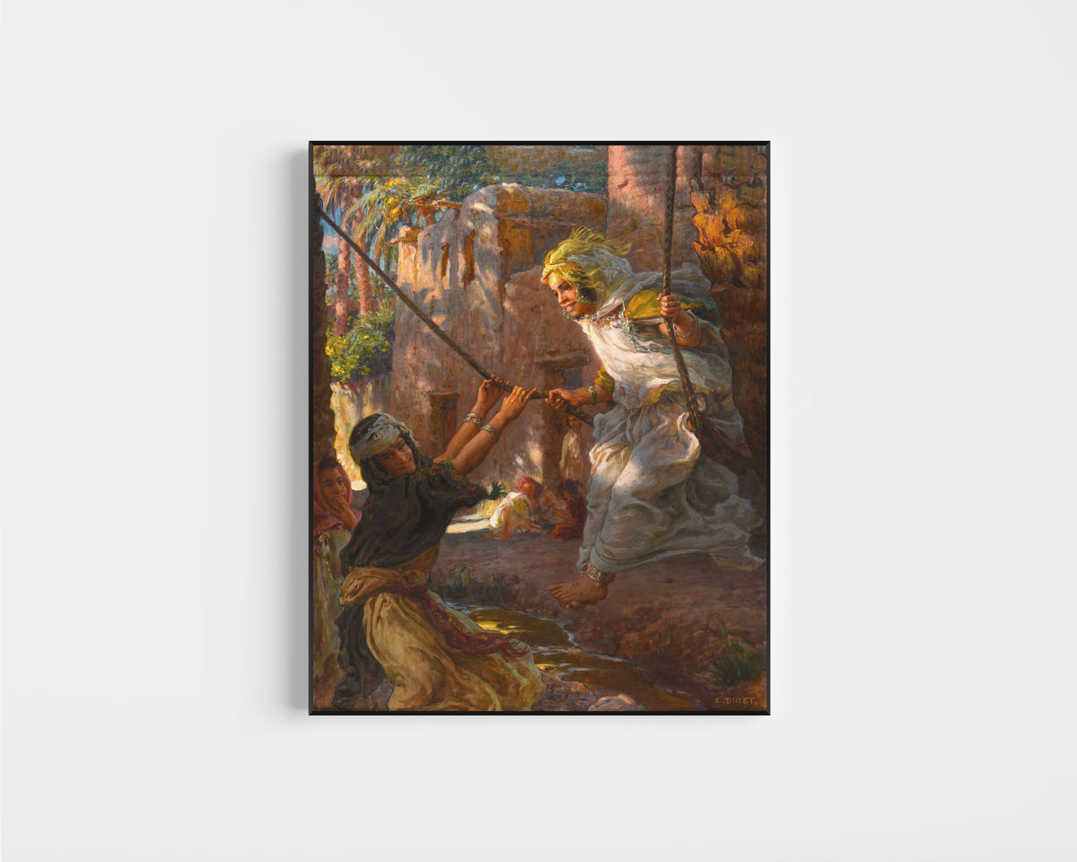 Framed art print of La Balançoire by Étienne Dinet, in a slim black frame on a plain white wall