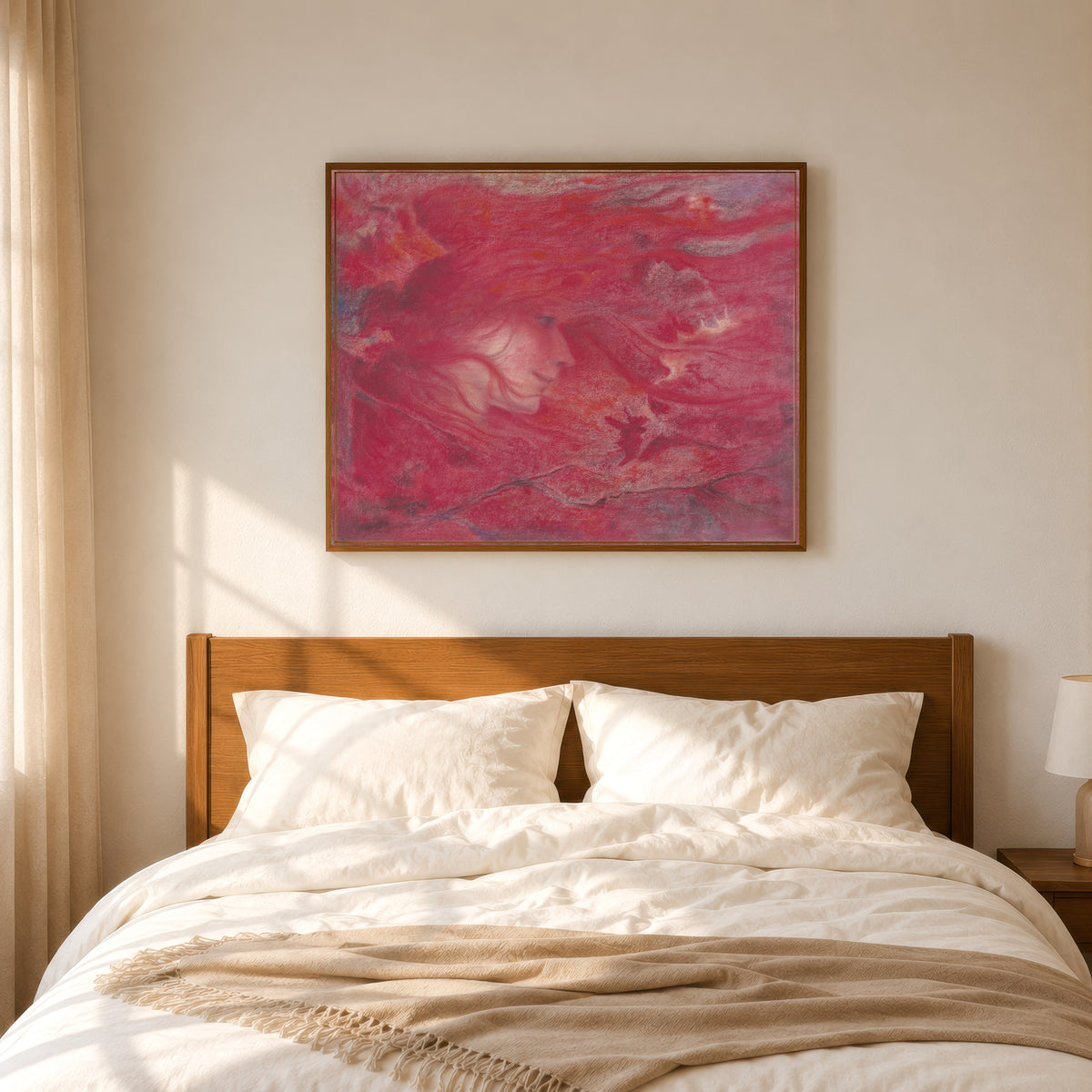 Framed art print of La bourrasque by Lucien Lévy-Dhurmer, in a slim wood frame above a bed in a sunlit bedroom