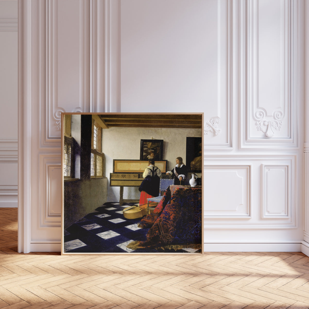 Framed art print of Lady at the Virginal with a Gentleman, ‘The Music Lesson’ by Johannes Vermeer, leaning against pale pink panelling on a herringbone floor