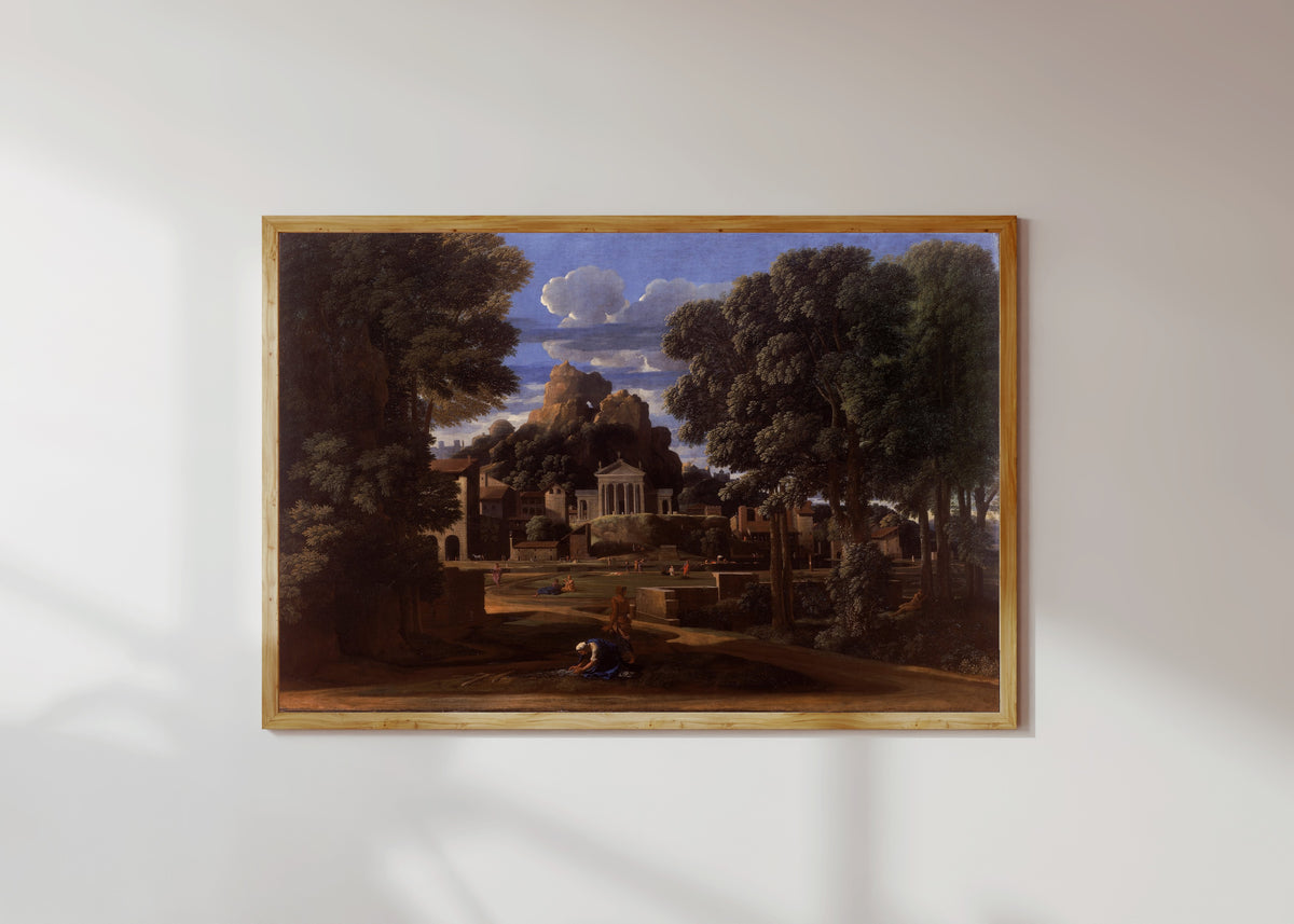 Framed art print of Landscape with the Ashes of Phocion by Nicolas Poussin, in a light wood frame on a sunlit white wall
