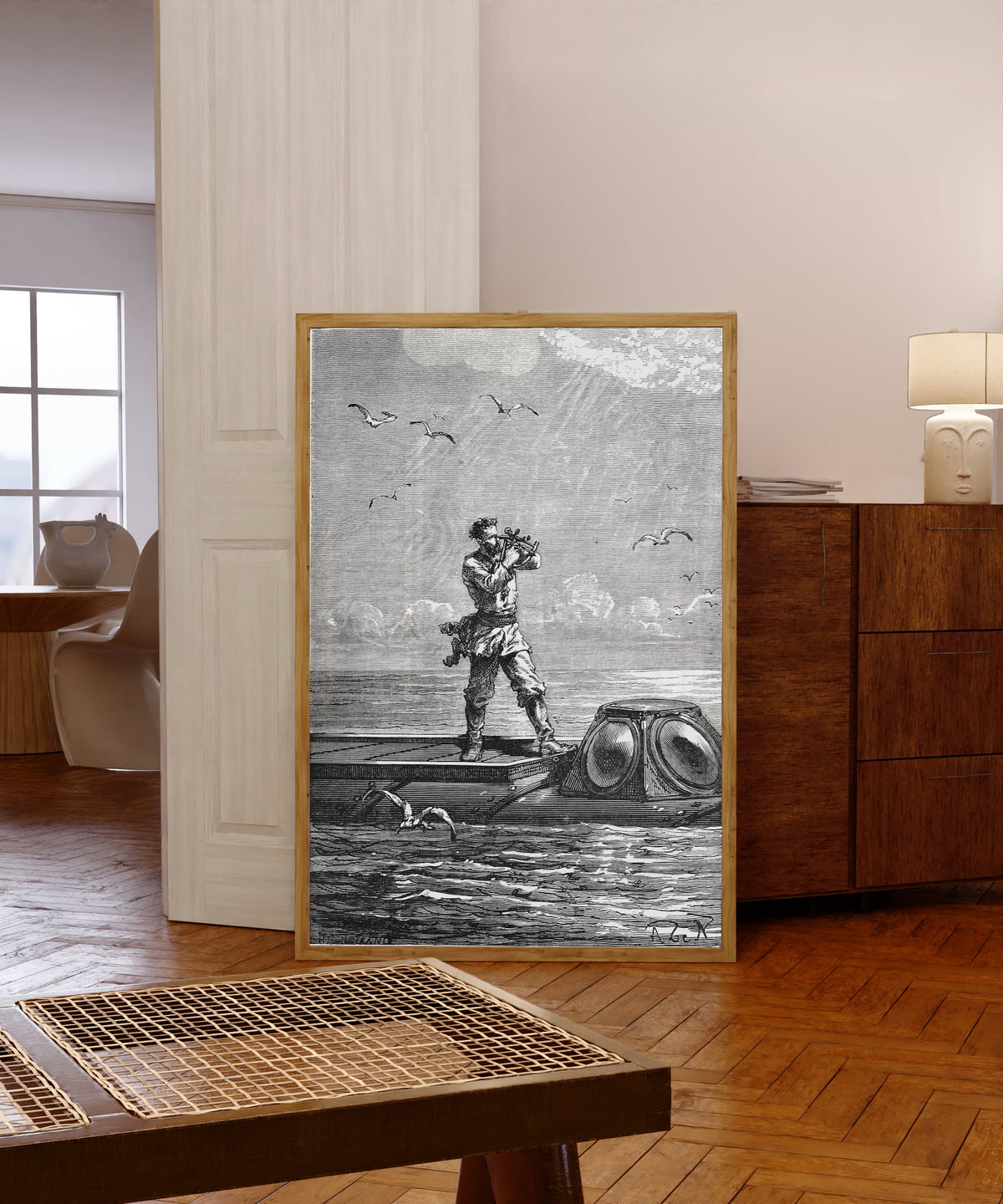 Framed art print of Le capitaine Nemo prit la hauteur du soleil… by Alphonse de Neuville, in a light wood frame leaning in a warm room with a parquet floor
