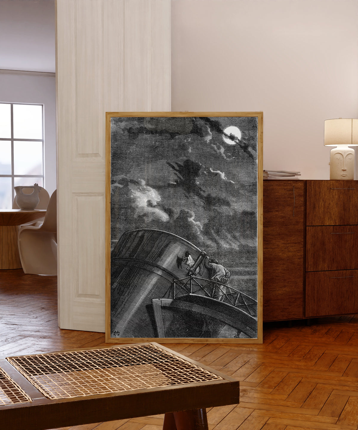 Framed art print of Le directeur était à son poste (The director was at… by Henri de Montaut, in a light wood frame leaning in a warm room with a parquet floor