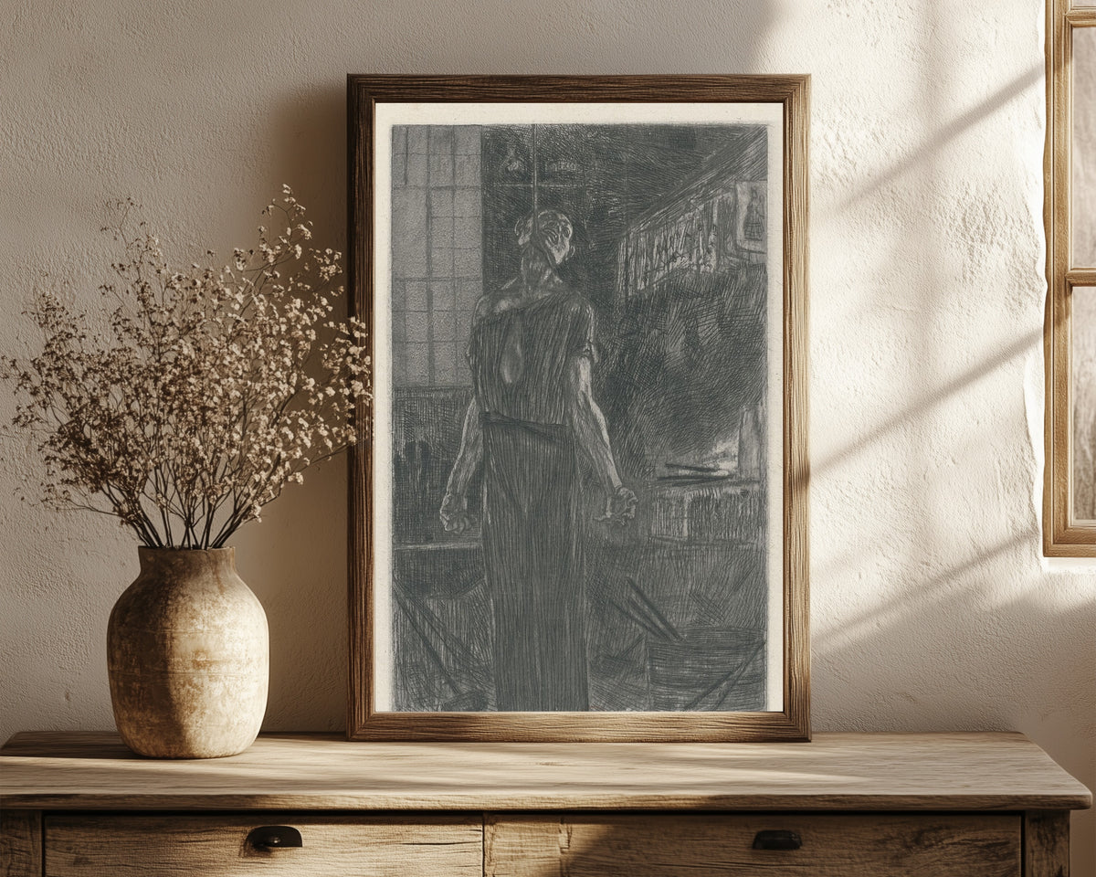 Framed art print of Le pendu dans la forge (2nd state) by Félicien Rops, in a dark wood frame leaning on a rustic console beside dried flowers