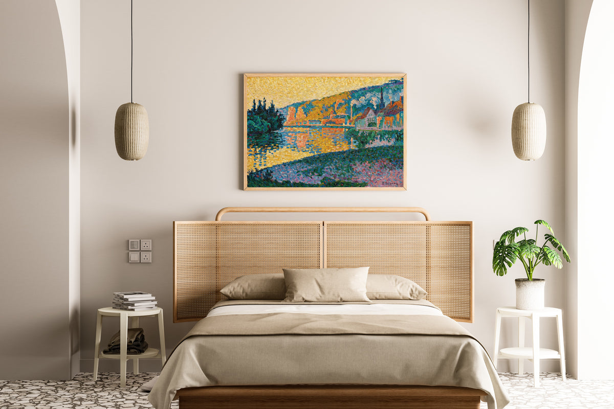 Framed art print of Les Andelys, Sunset by Paul Signac, above a cane-headboard bed