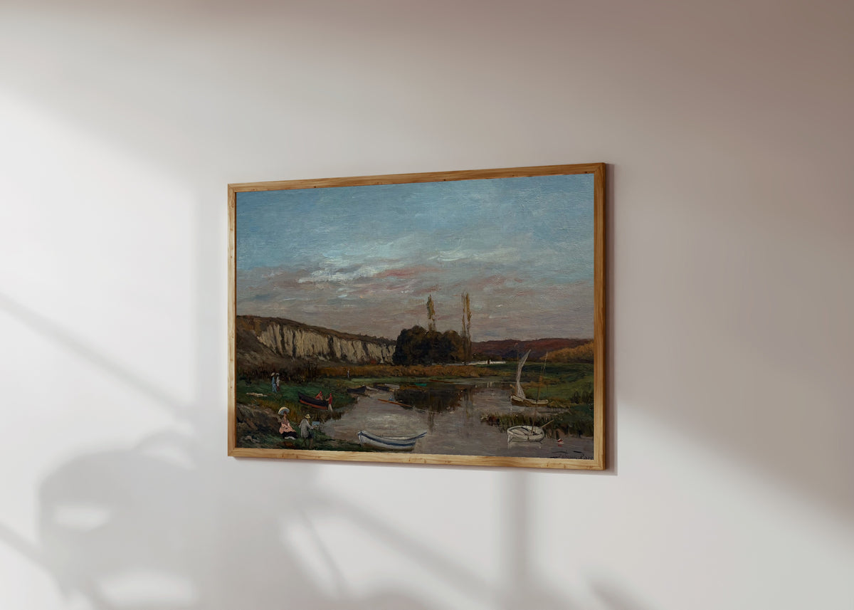 Framed art print of Les Rochers des Grands Malades by Félicien Rops, in a light wood frame on a sunlit white wall, seen at a slight angle