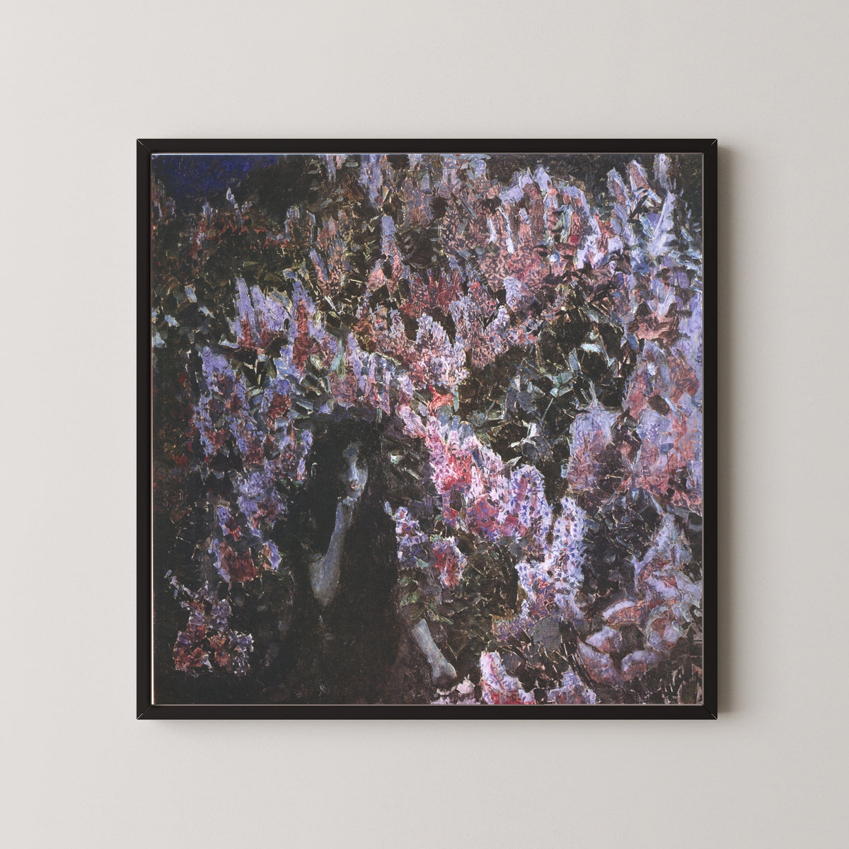 Framed art print of Lilacs by Mikhail Vrubel, in a black frame on a pale wall