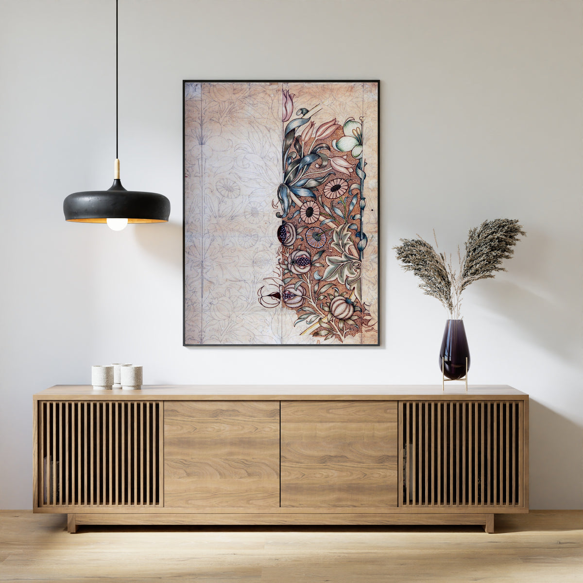 Framed art print of Lily and Pomegranate (Design Drawing) by William Morris, above a slatted wood sideboard