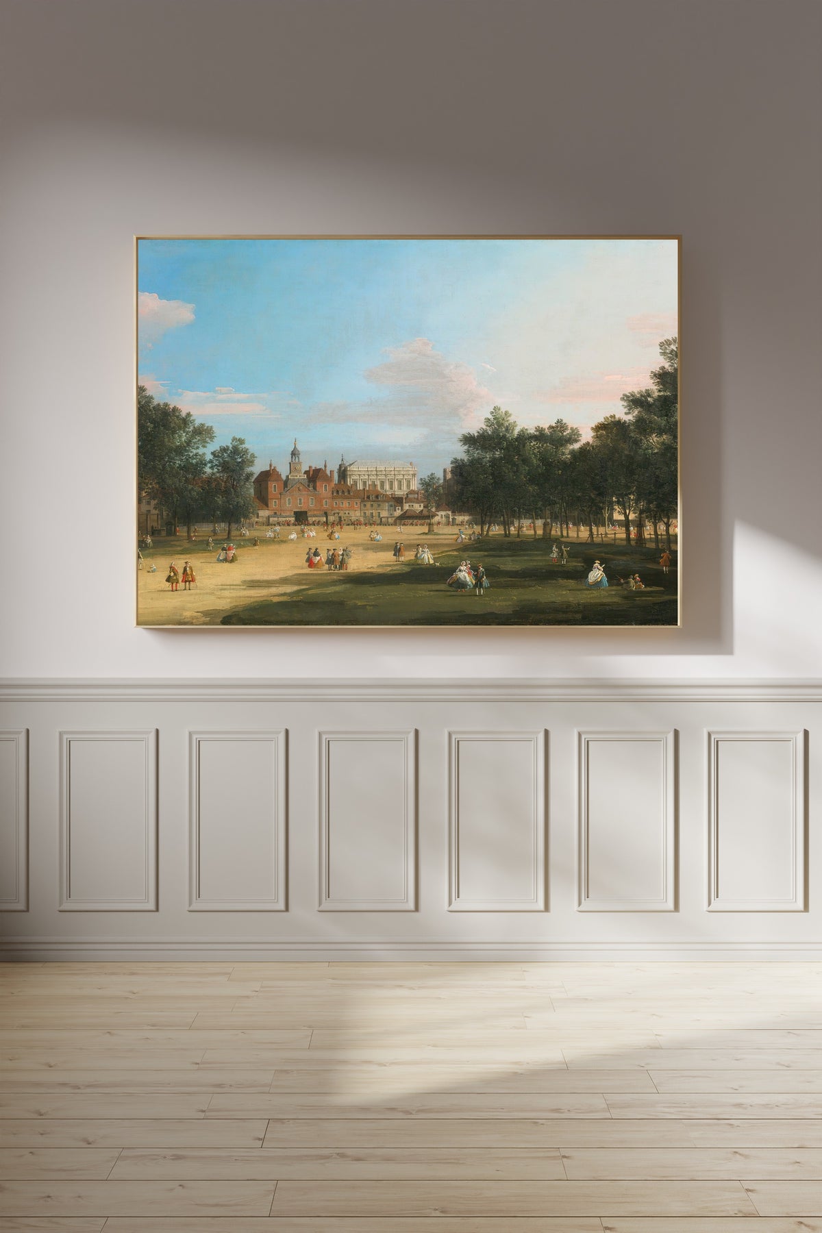 Framed art print of London, A View of the Old Horse Guards and Banqueting Hall, Whitehall Seen from St.… by Canaletto, on a panelled wall in afternoon light
