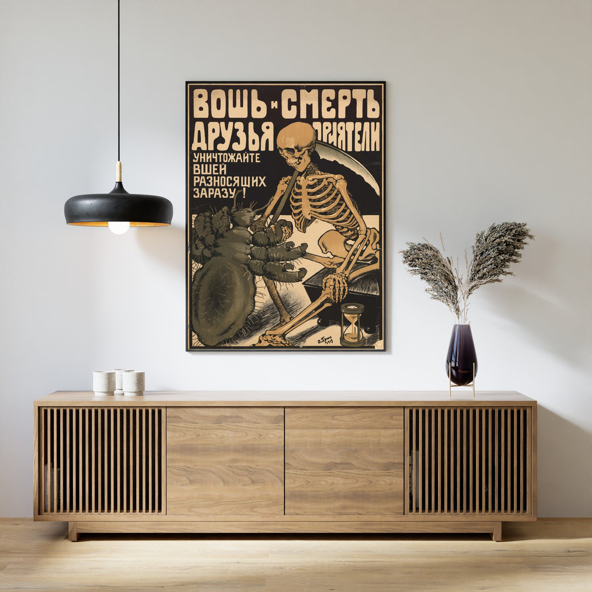Framed art print of Louse and Death Are Friends. Destroy the Lice That Spread Infection! by Oskar Grun, above a slatted wood sideboard
