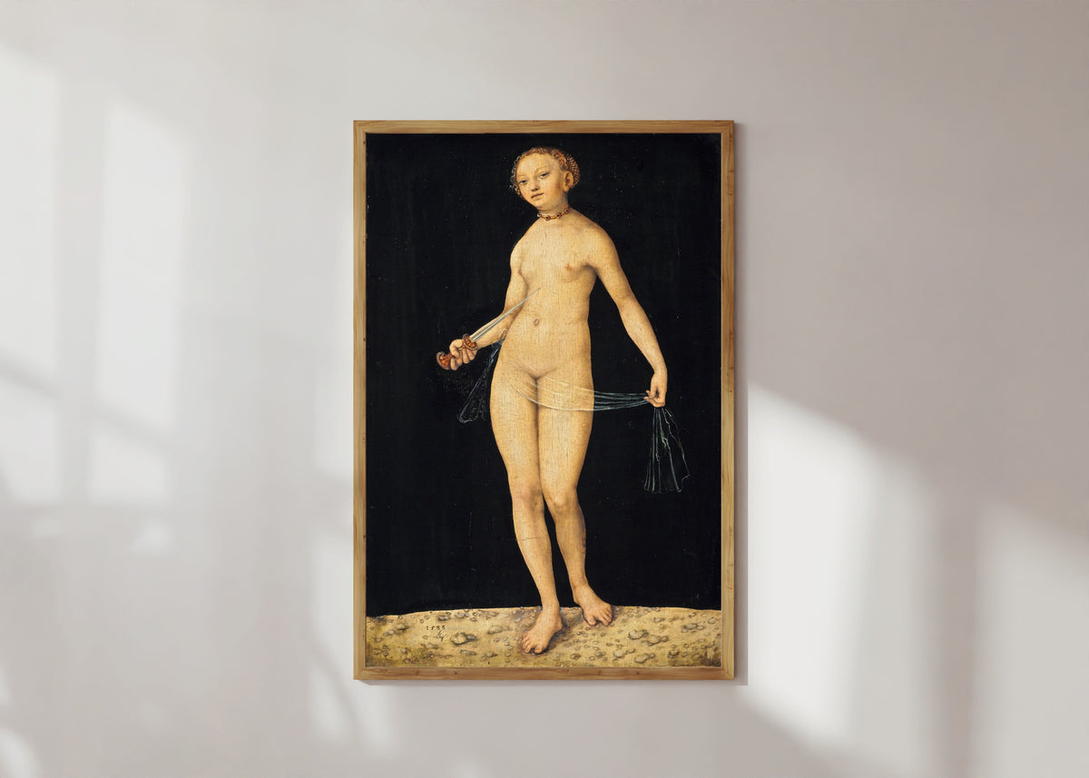 Framed art print of Lucretia by Lucas Cranach the Elder, in a light wood frame on a sunlit white wall