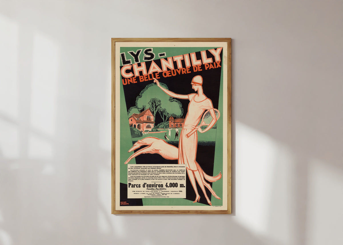 Framed art print of Lys-Chantilly: une belle œuvre de paix by Roger Broders, in a light wood frame on a sunlit white wall