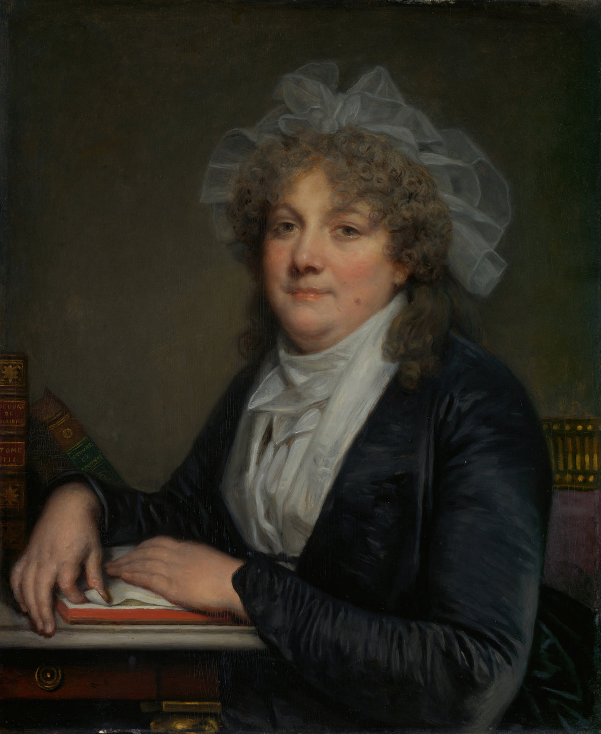 Madame Jean-Baptiste Nicolet (Anne Antoinette Desmoulins, 1743-1817) by Jean-Baptiste Greuze — A woman in a white tulle cap rests her hands on an open book