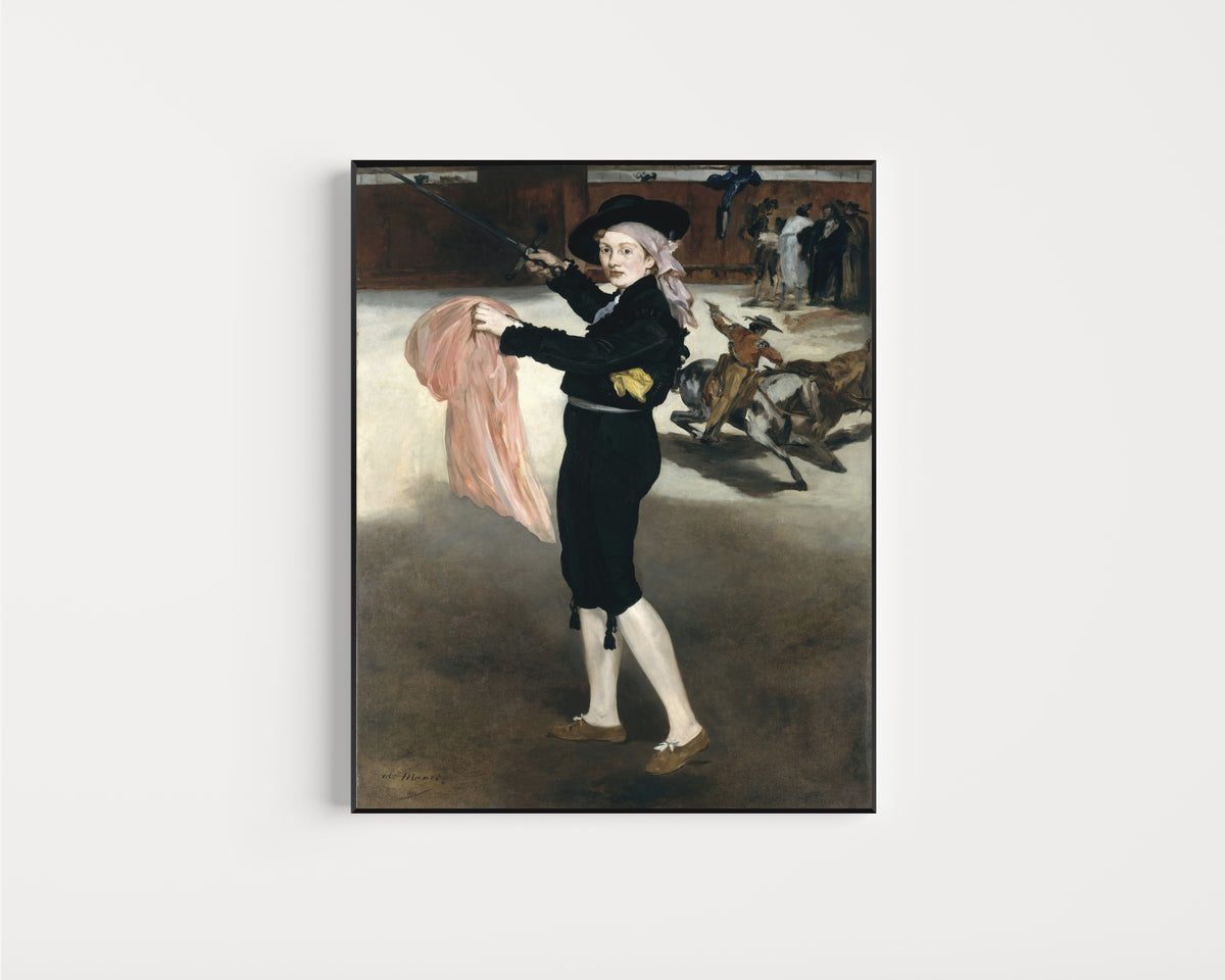 Framed art print of Mademoiselle V. . . in the Costume of an Espada by Édouard Manet, in a slim black frame on a plain white wall
