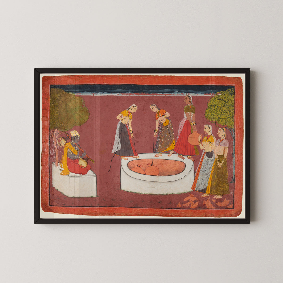 Framed art print of Madhava plays his vina before five women drawing water from a well by Pahari school, in a black frame on a pale wall