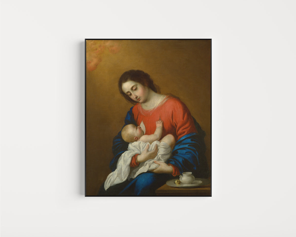 Framed art print of Madonna and Child by Francisco de Zurbarán, in a slim black frame on a plain white wall