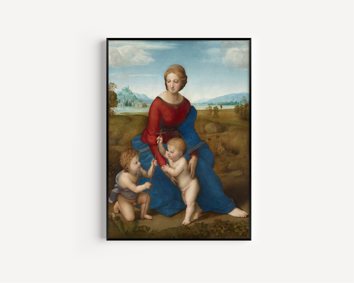 Framed art print of Madonna in the Meadow by Raphael, in a slim black frame on a plain white wall