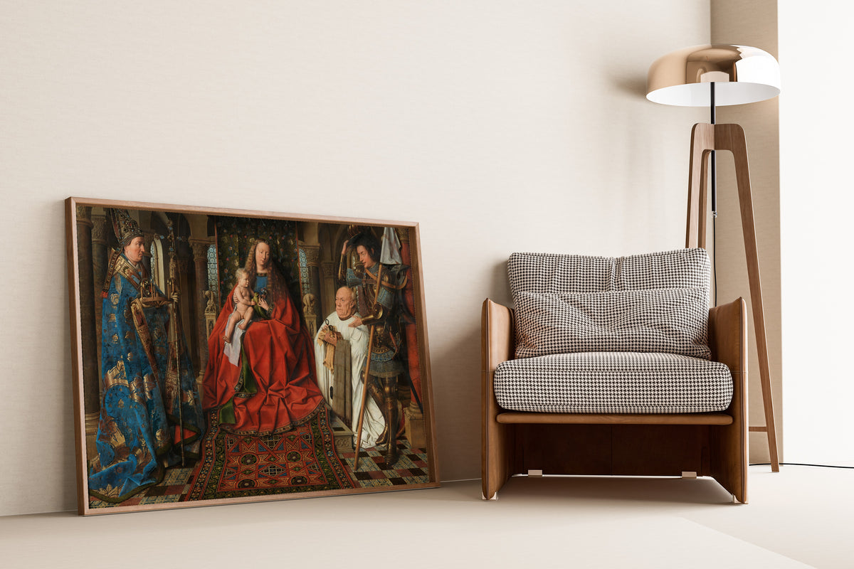 Framed art print of Madonna with Canon Joris van der Paele by Jan van Eyck, leaning against a wall beside an armchair and a floor lamp
