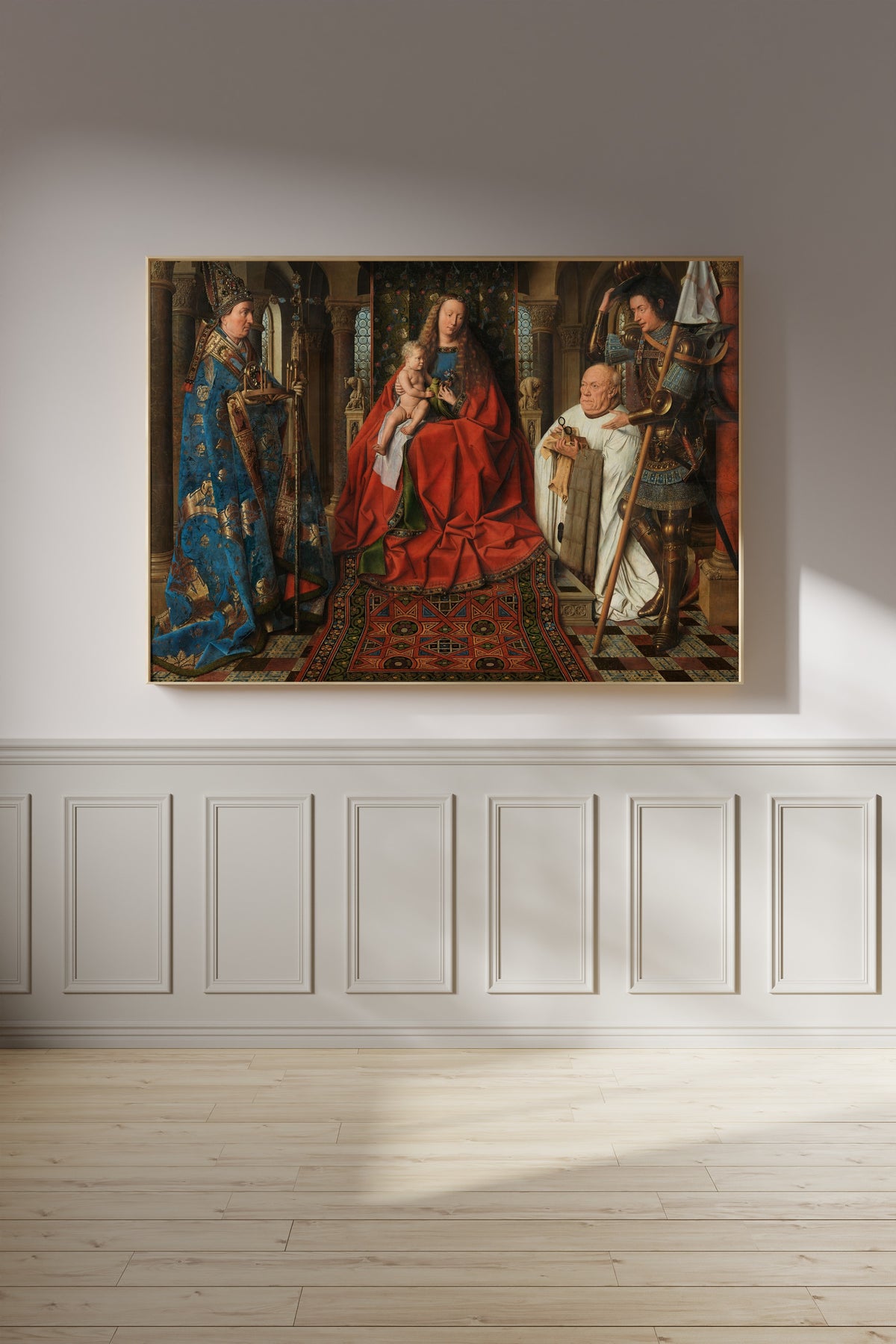Framed art print of Madonna with Canon Joris van der Paele by Jan van Eyck, on a panelled wall in afternoon light