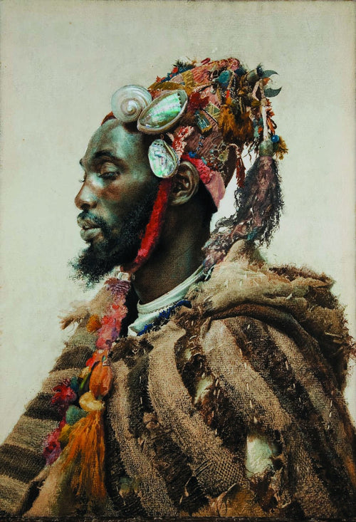 Man with a Shell Headdress by Josep Tapiró Baró — A profile portrait crowned with abalone shells and tassels