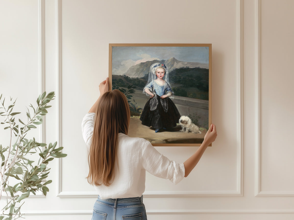 Framed art print of María Teresa de Borbón y Vallabriga, later Condesa de Chinchón by Francisco de Goya, hung on a panelled wall