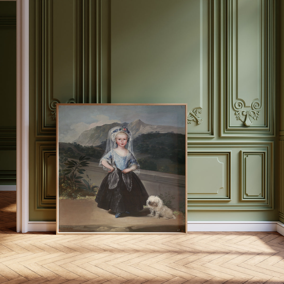 Framed art print of María Teresa de Borbón y Vallabriga, later Condesa de… by Francisco de Goya, leaning against olive-green panelling on a herringbone floor