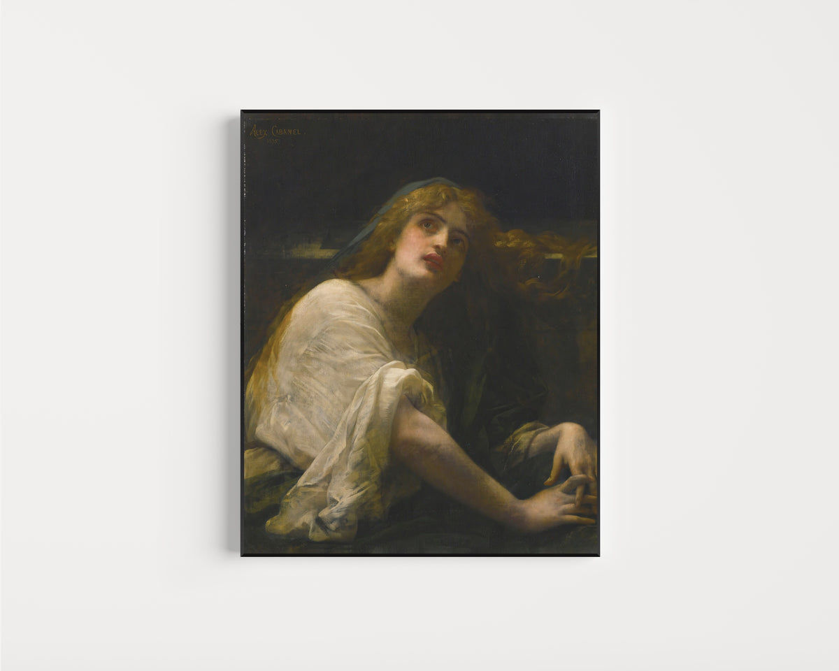 Framed art print of Mary Magdalene at the Tomb by Alexandre Cabanel, in a slim black frame on a plain white wall