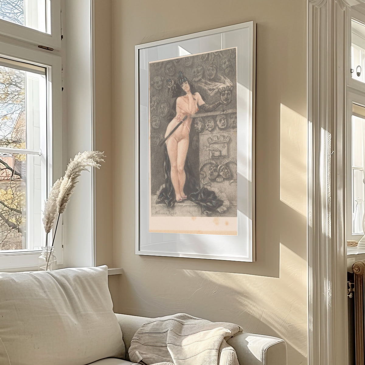 Framed art print of Masques parisiennes (hand-coloured) by Félicien Rops, in a sunlit living room above a sofa