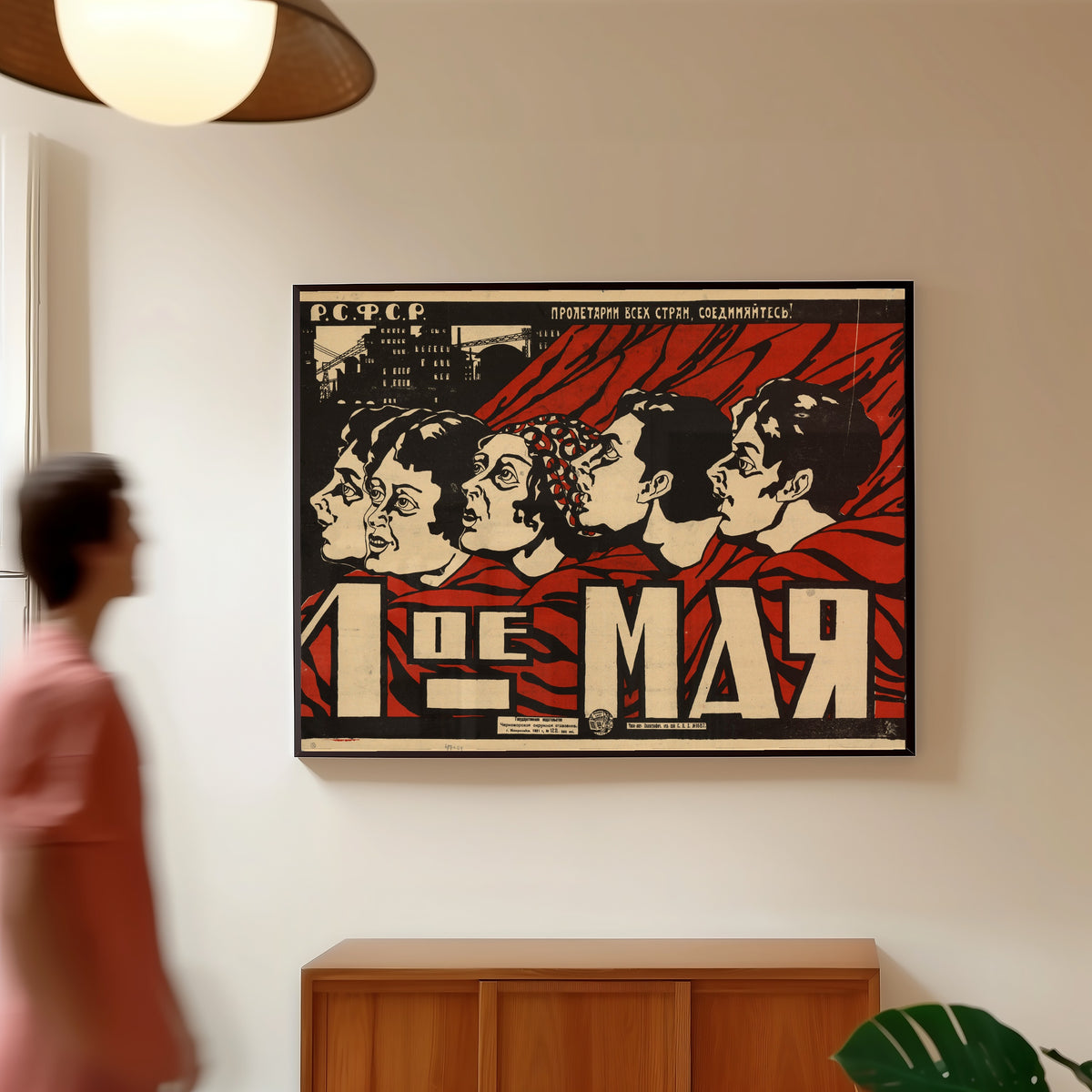Framed art print of May 1st, in a slim black frame on a warm wall in a sunlit room