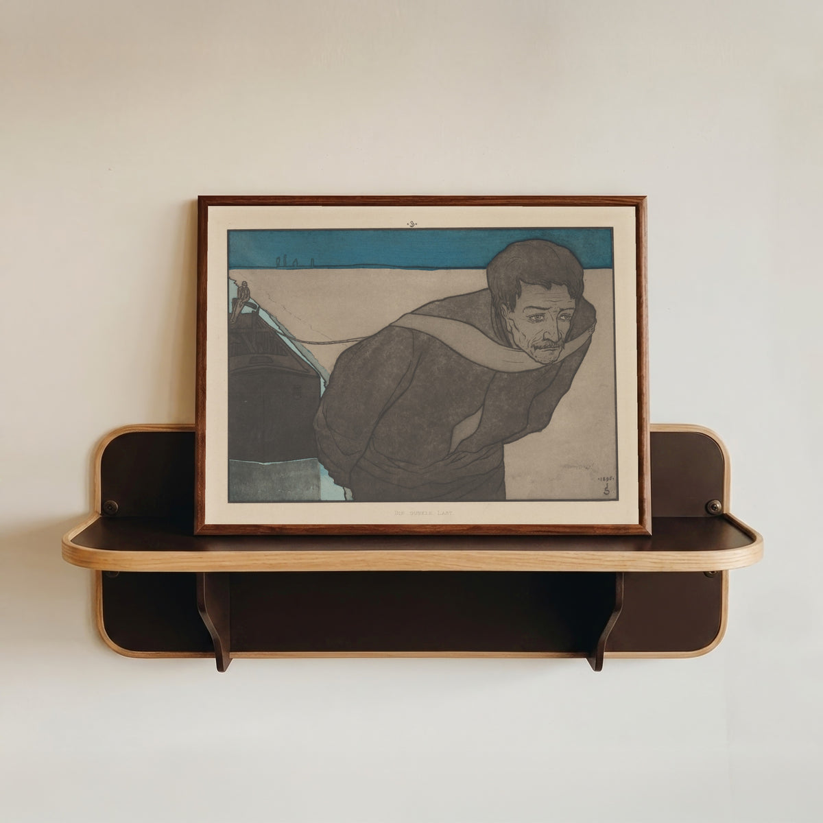 Framed art print of Meine Harmonie: Plate 7 by Joseph Sattler, in a dark wood frame resting on a wall shelf
