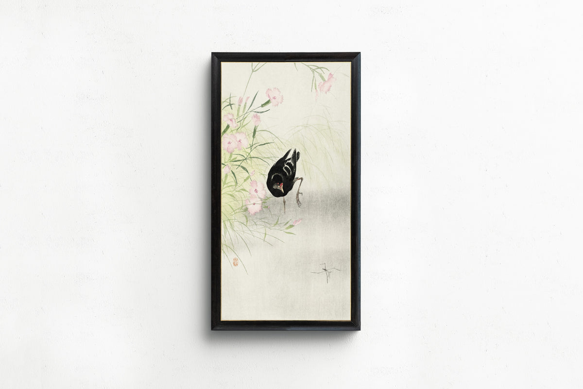 Framed art print of Moorhen at a Flowering Plant by Ohara Koson, in a slim black frame on a plain white wall