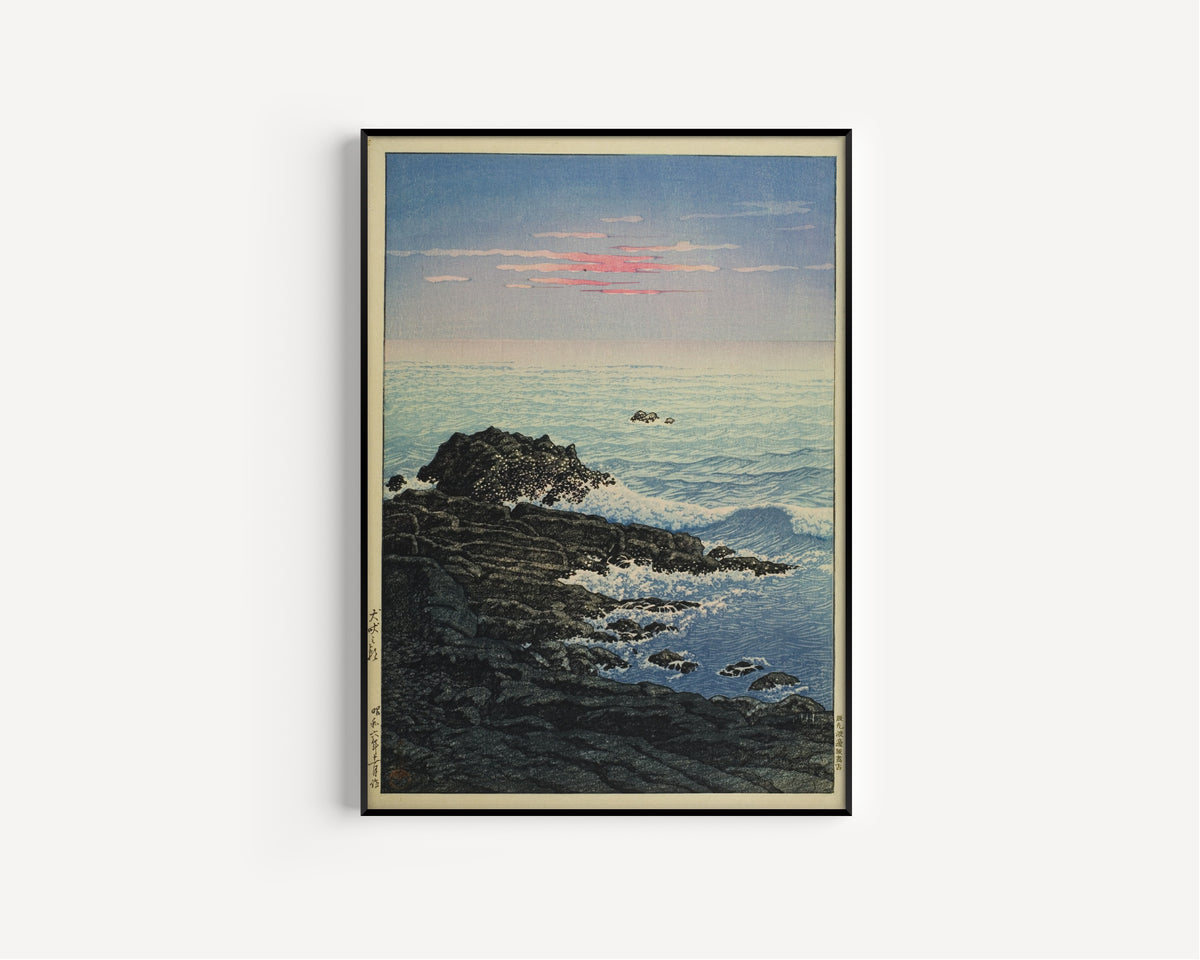 Framed art print of Morning at Cape Inubo by Kawase Hasui, in a slim black frame on a plain white wall