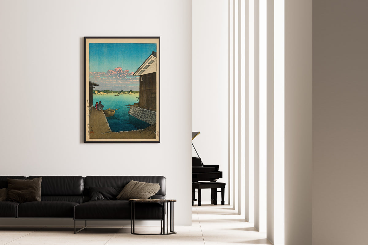 Framed art print of Morning in Yobuko, Hizen by Kawase Hasui, on the wall of a minimal living room