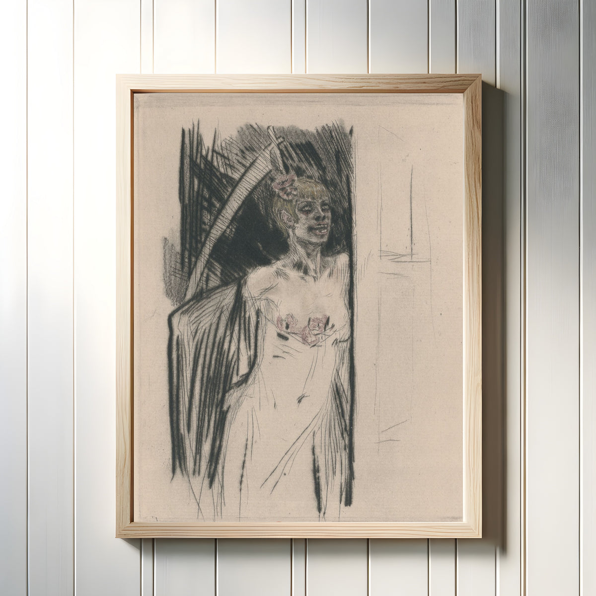 Framed art print of Mors syphilitica (2nd state, heightened proof) by Félicien Rops, in a light wood frame on a white panelled wall