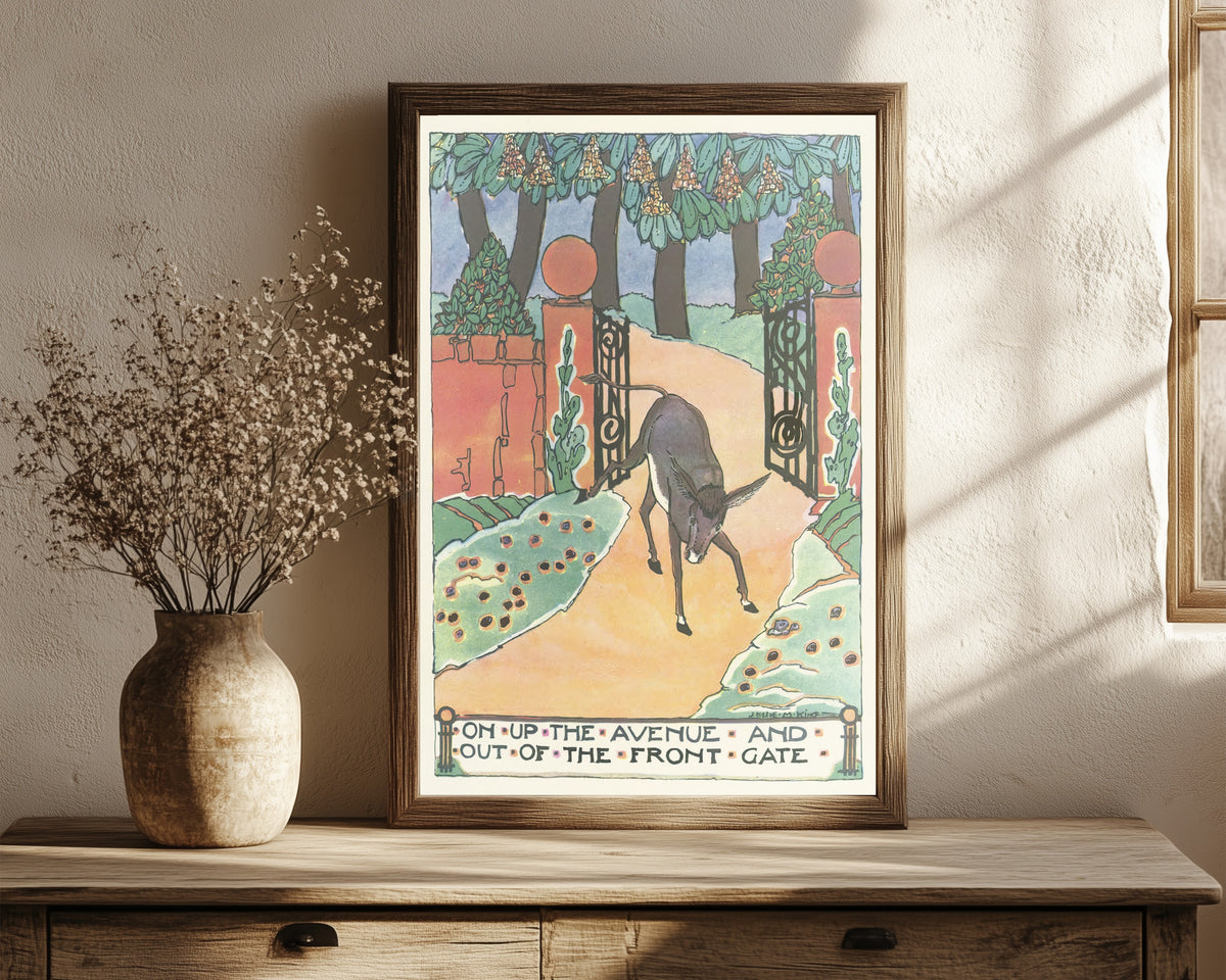 Framed art print of Mummy's Bedtime Story Book: On Up the Avenue and… by Jessie M. King, in a dark wood frame leaning on a rustic console beside dried flowers