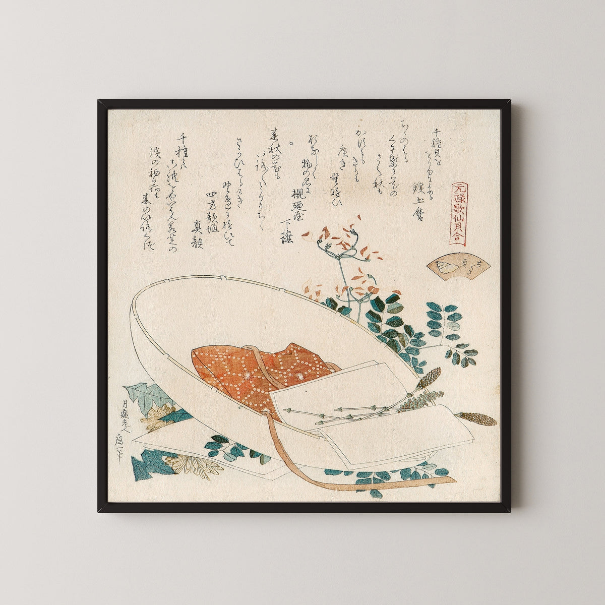 Framed art print of Myriad Grasses Shell by Katsushika Hokusai, in a black frame on a pale wall