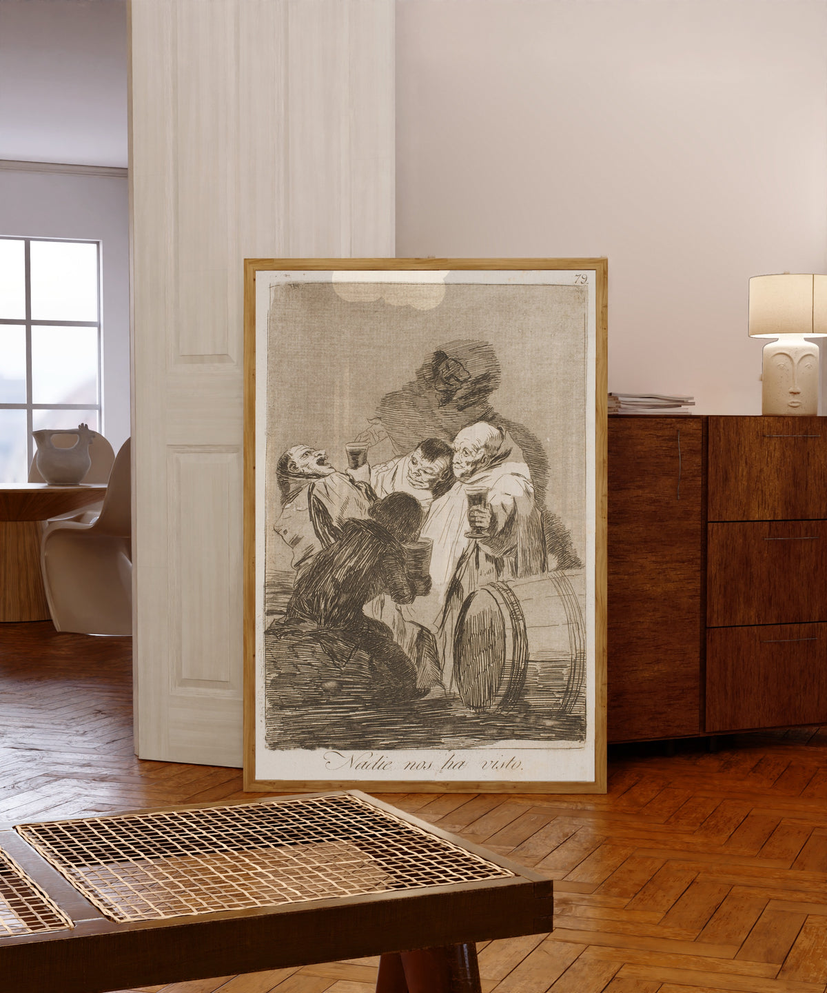 Framed art print of Nadie nos ha visto (Nobody Has Seen Us), Los… by Francisco de Goya, in a light wood frame leaning in a warm room with a parquet floor