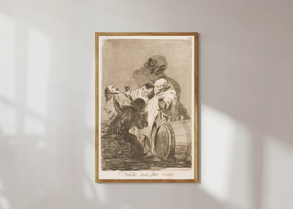 Framed art print of Nadie nos ha visto (Nobody Has Seen Us), Los Caprichos, Plate 79 by Francisco de Goya, in a light wood frame on a sunlit white wall