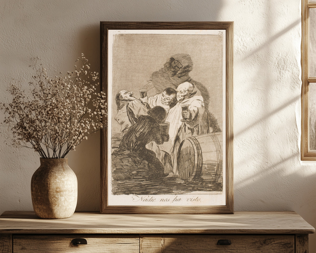 Framed art print of Nadie nos ha visto (Nobody Has Seen Us), Los… by Francisco de Goya, in a dark wood frame leaning on a rustic console beside dried flowers