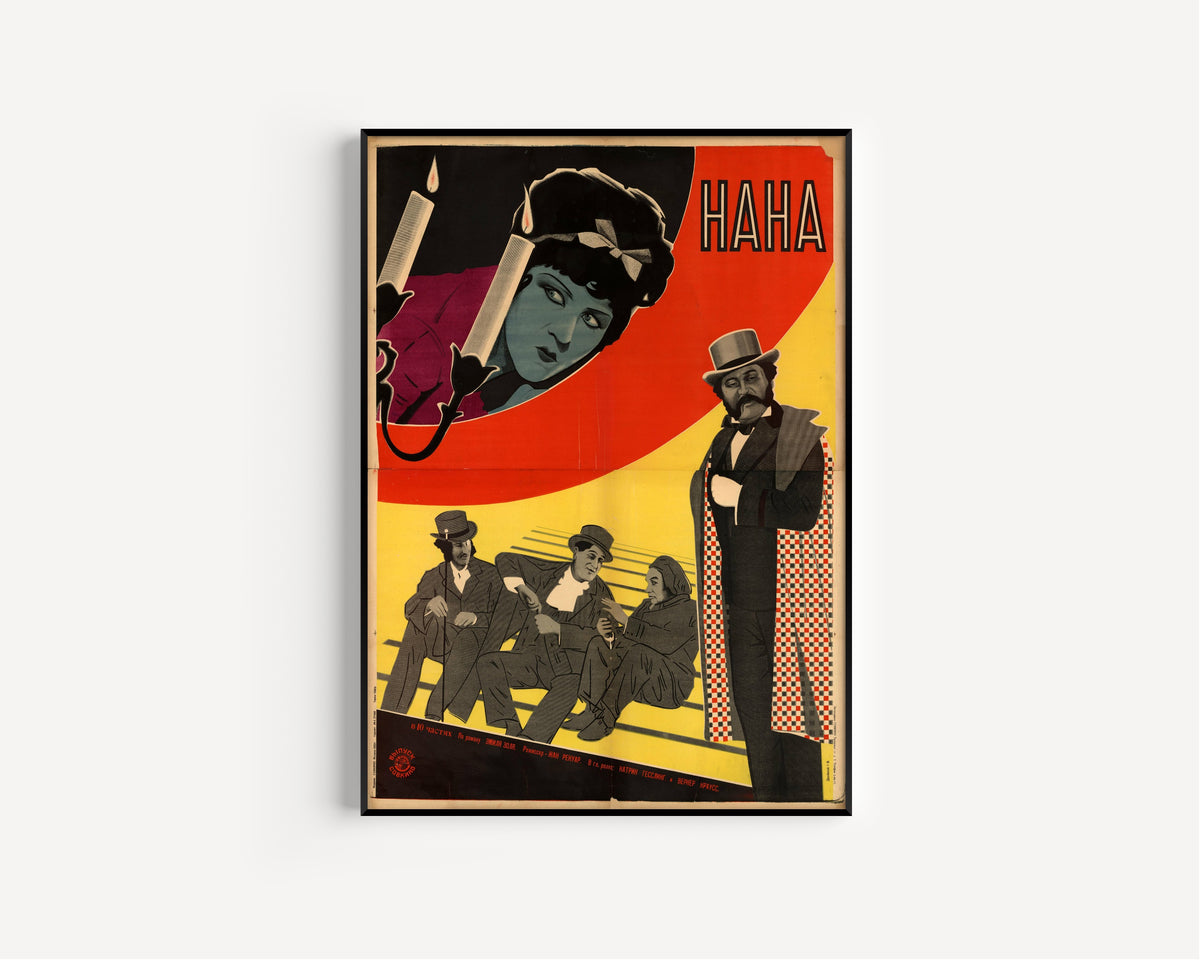 Framed art print of Nana, in a slim black frame on a plain white wall