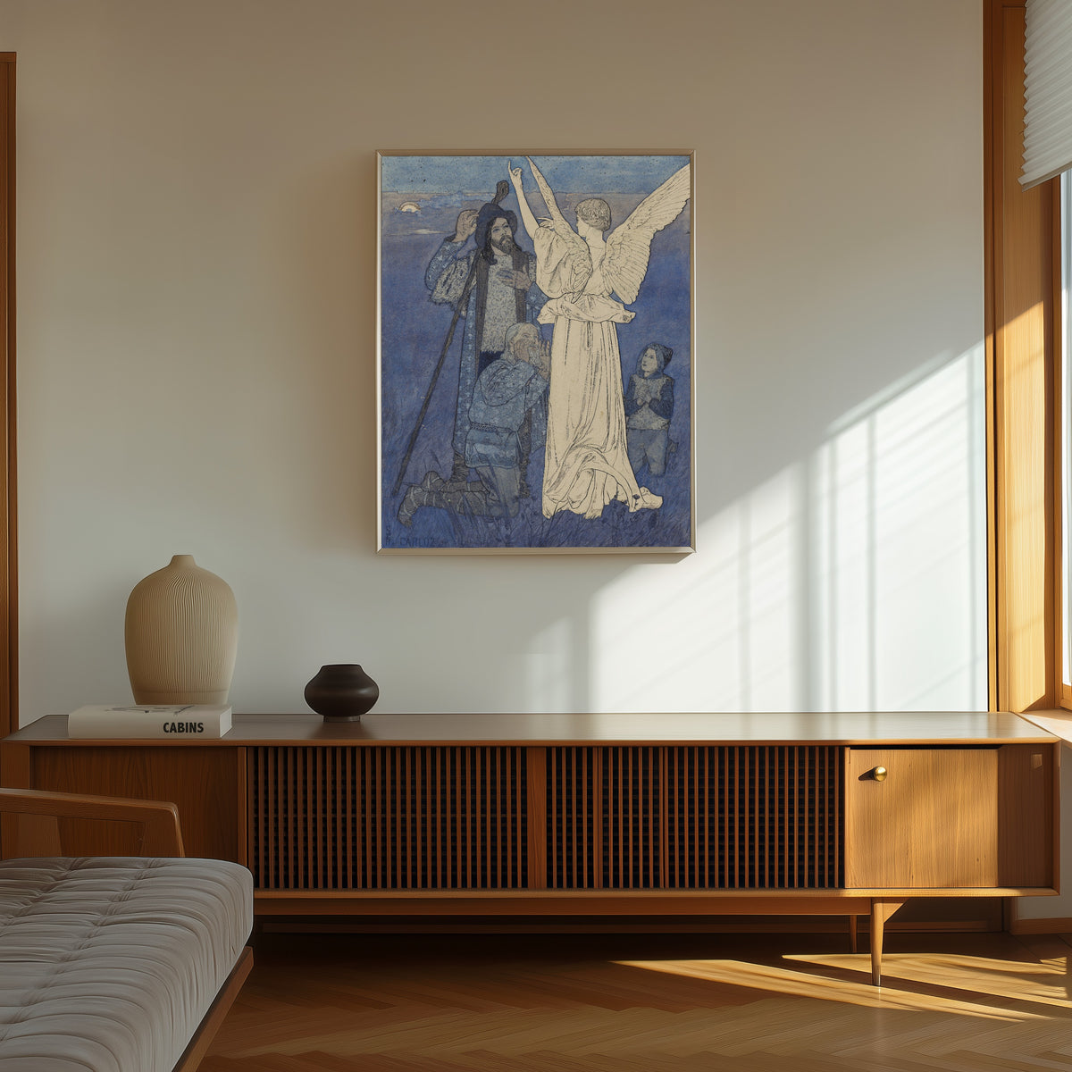 Framed art print of Natividade, Canto da Meia-Noite by Carlos Schwabe, in a thin light frame on a sunlit wall above a wooden sideboard