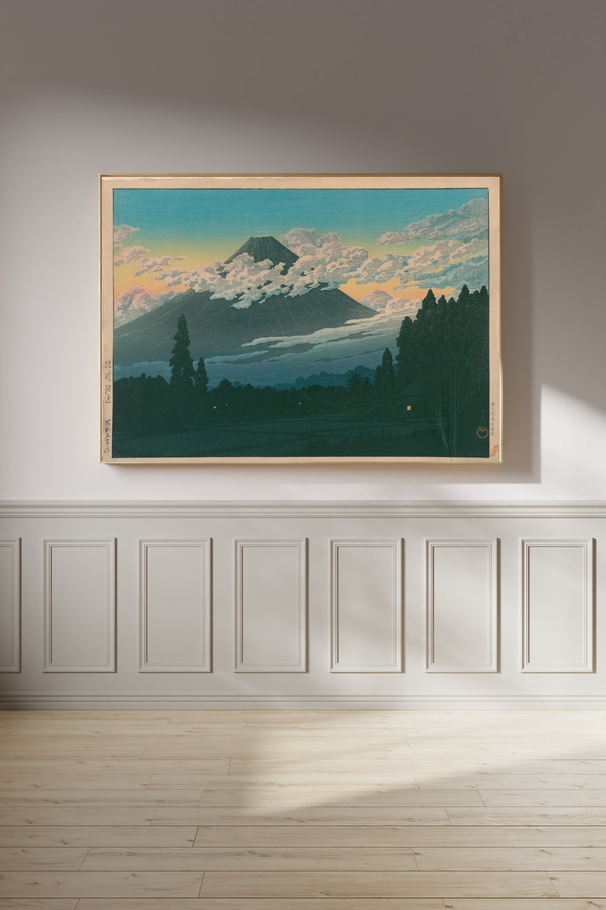 Framed art print of Near Susono by Kawase Hasui, on a panelled wall in afternoon light