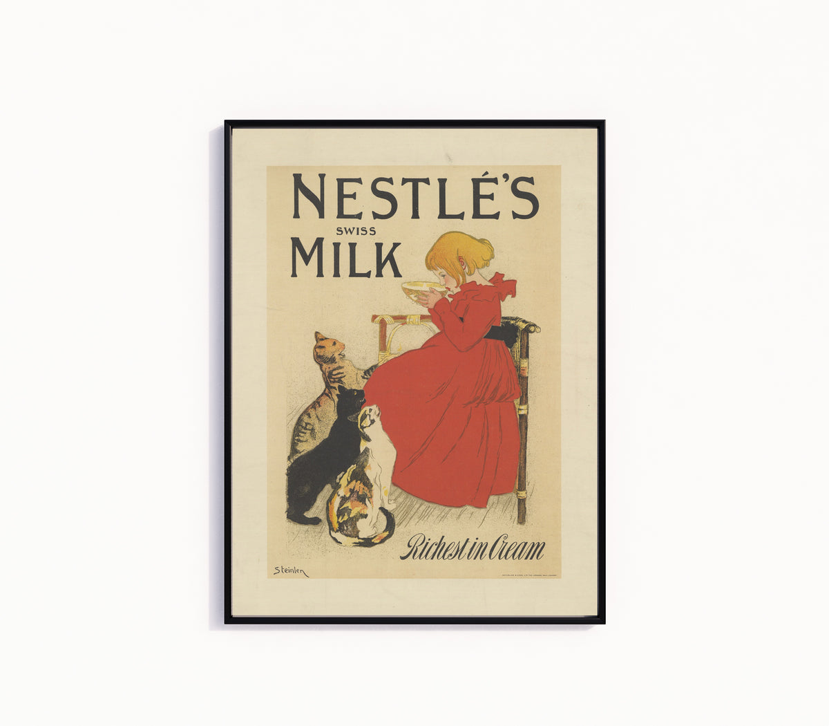 Framed art print of Nestlé’s Swiss Milk, Richest in Cream by Théophile Steinlen, in a slim black frame on a plain white wall