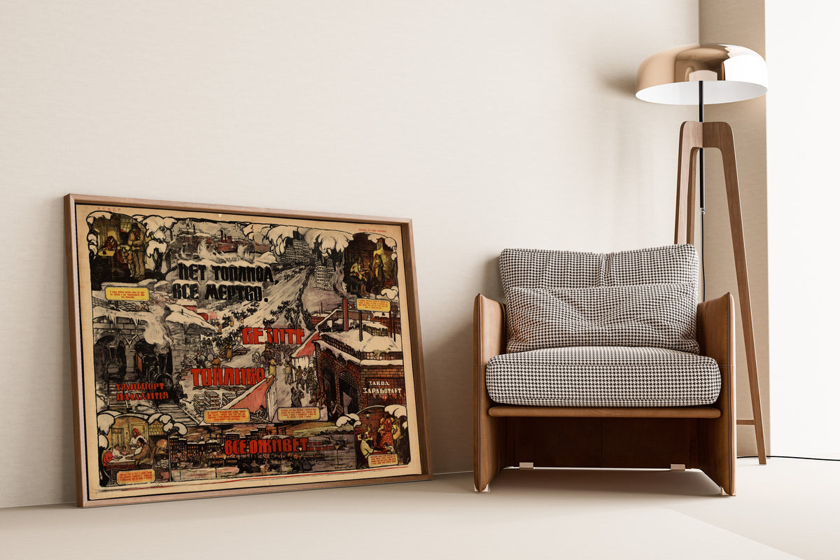Framed art print of No Fuel, Everything Is Dead. Bring Fuel, Everything Will… by Nikolai Pomansky, leaning against a wall beside an armchair and a floor lamp