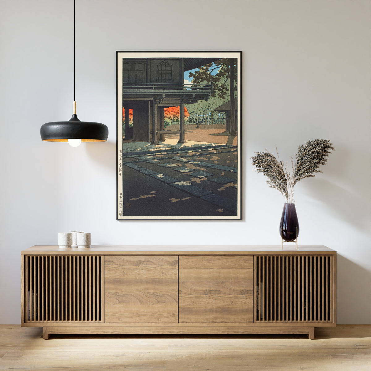 Framed art print of Nobidome Heirin-ji Temple by Kawase Hasui, above a slatted wood sideboard