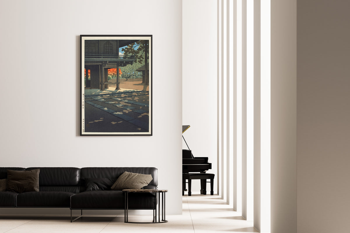 Framed art print of Nobidome Heirin-ji Temple by Kawase Hasui, on the wall of a minimal living room