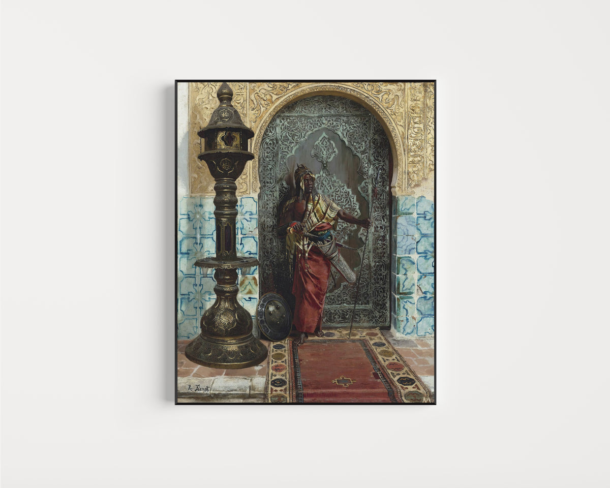 Framed art print of Nubian Guard by Rudolf Ernst, in a slim black frame on a plain white wall
