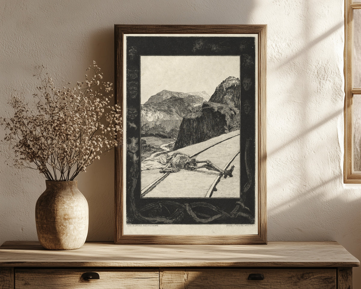 Framed art print of On Death I: On the Tracks by Max Klinger, in a dark wood frame leaning on a rustic console beside dried flowers